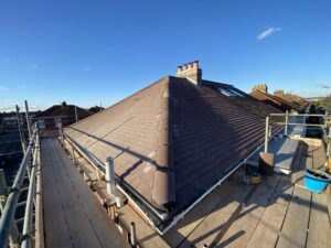 A new pitched roof that has been installed on a house by Guildford Roofers.