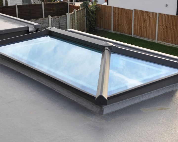A GRP flat roof that has been installed with a skylight.