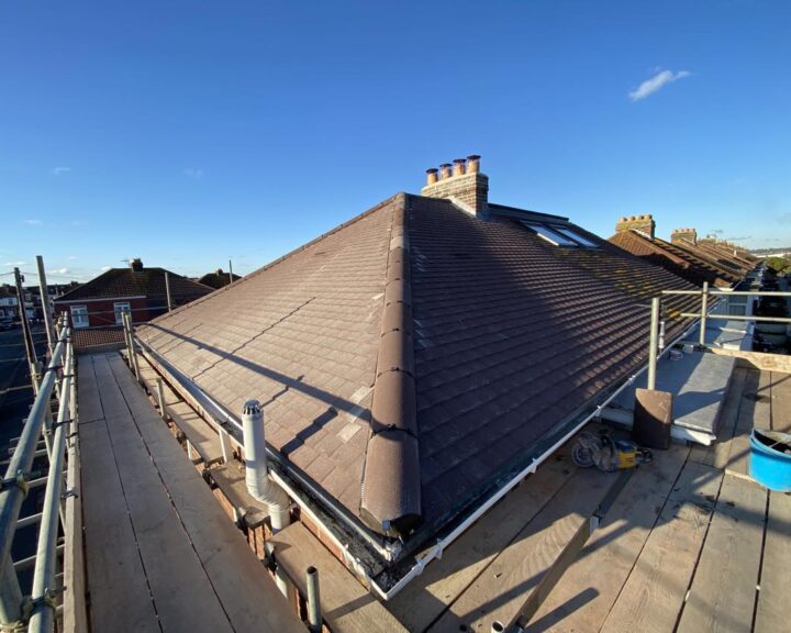 A new pitched roof that has been installed on a house by Guildford Roofers.