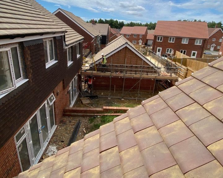 A new roof being installed on a new build property in Guildford.