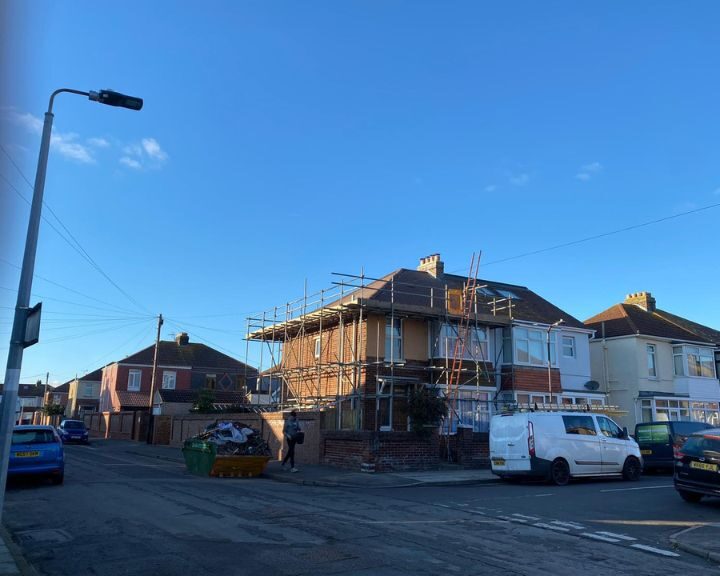 A scaffolding that has been erected on a residential property for roof repairs to be undertaken.